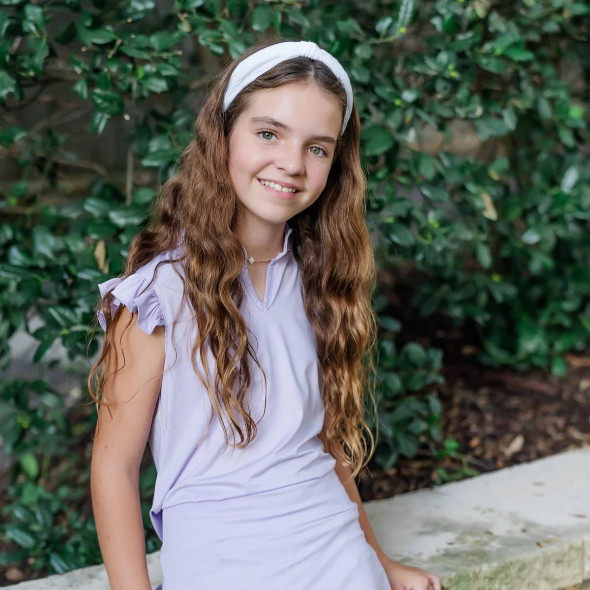 LILA AND HAYES ELLIE GIRLS' SLEEVELESS RUFFLED TOP BY LH SPORT - Lavender